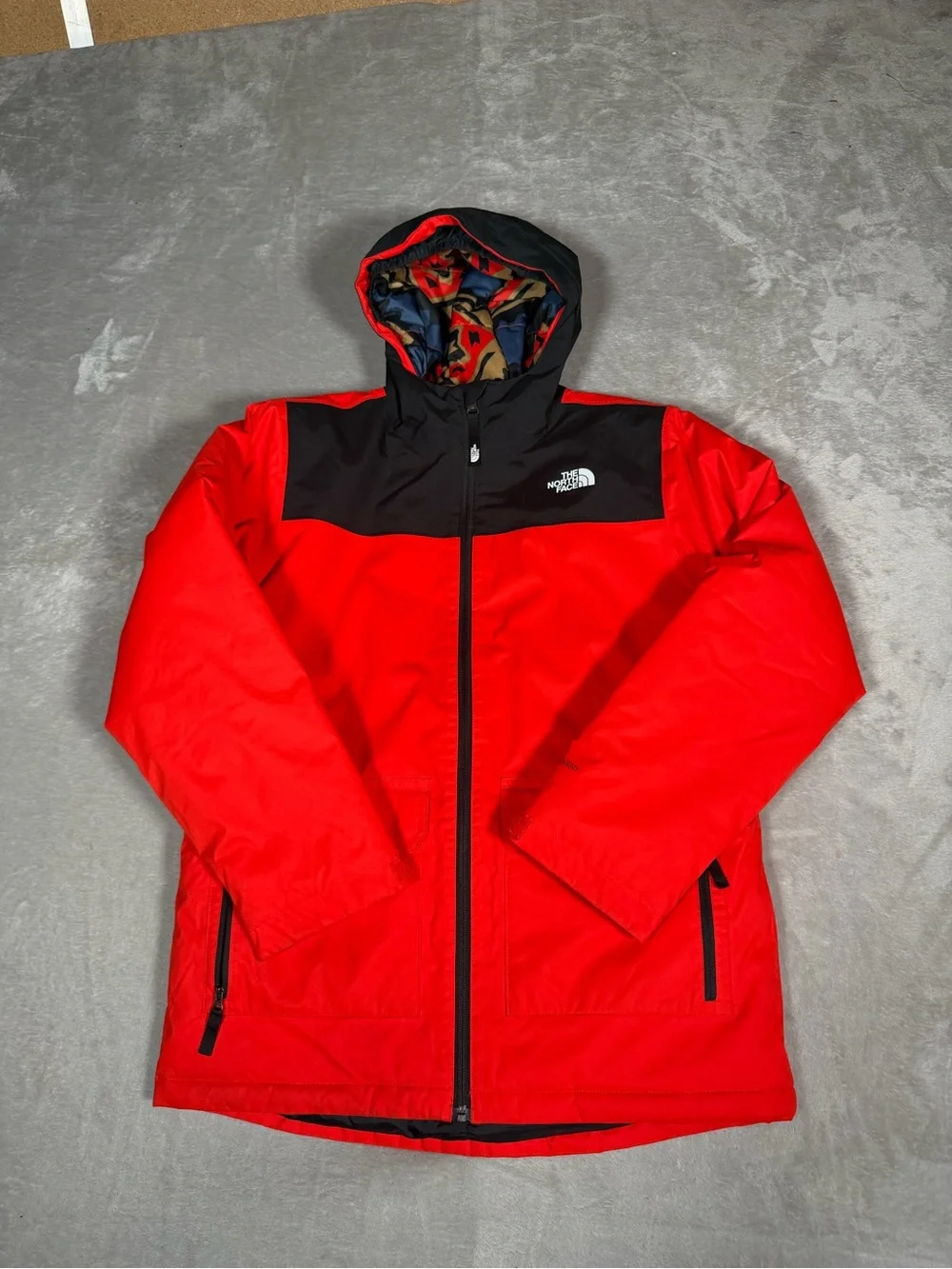 The North Face Red and Black Hooded Raincoat with Patterned Lining